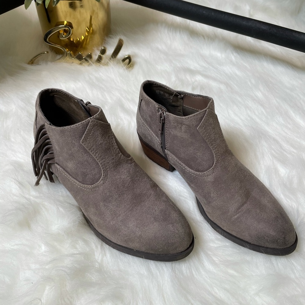 Gently used cowboy ankle booties with fringes